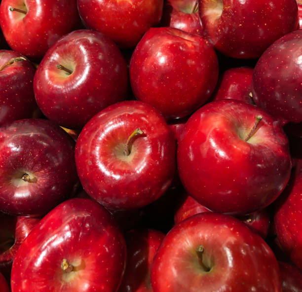 istock many apples on display in a supermarket 1212314667