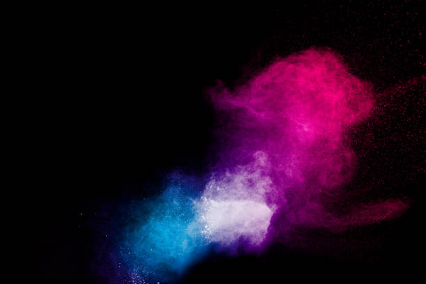 istock Multicolored powder explosion on black background.Color dust splash cloud on dark background.Launched colorful particles. 1212322135