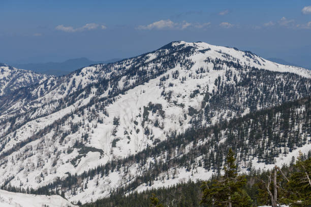 istock Mt. Mitsuiwadake seen from Mt. Aizukomagatake in the spring 1212322254