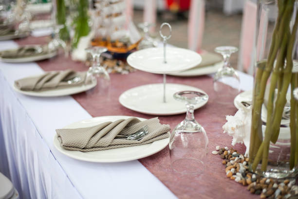 istock beautiful served table setting with plates on outdoor park 1212322414