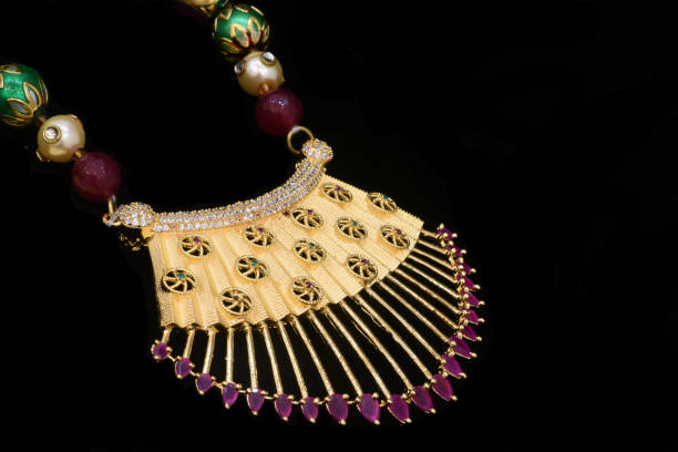 istock Fancy Designer Jewelry - Pendant closeup macro image on black background 1212328450