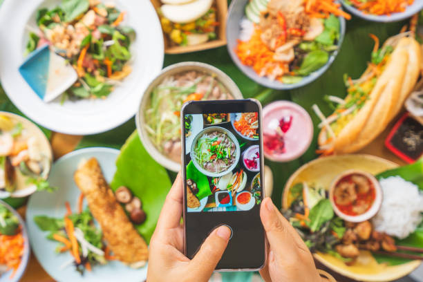 istock Photographing Vietnamese food table. 1212329343
