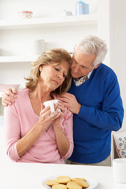 istock Senior Man Consoling Wife 121233131