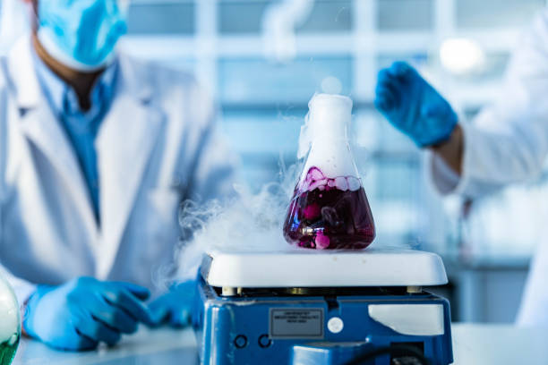 istock Purple liquid in a beaker on magnetic stirrer in laboratory. 1212332890