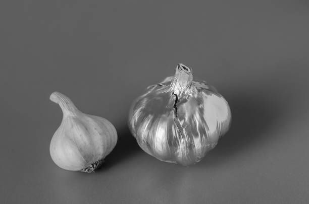 istock Two heads of garlic. 1212335396