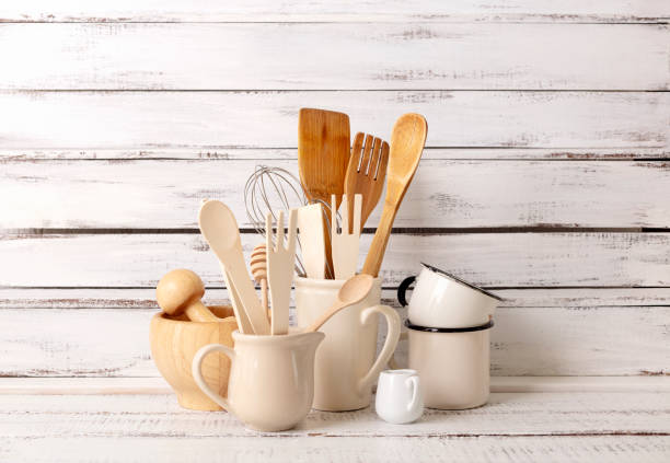 istock Baking kitchenware and baking products on white wooden background. 1212336583