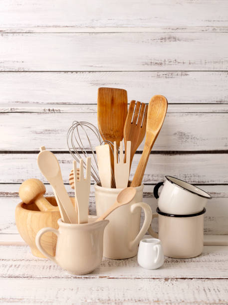 istock Baking kitchenware and baking products on white wooden background. 1212336585