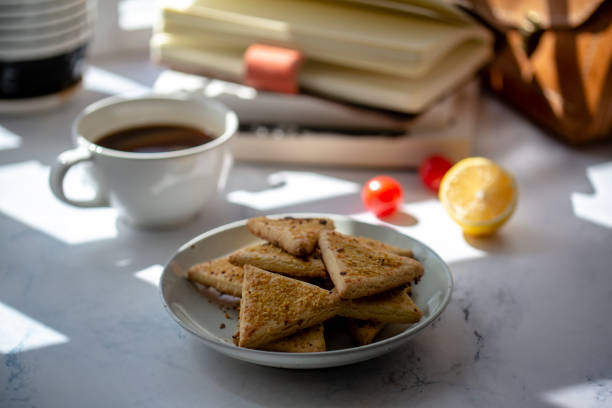 istock home baked wholewheat biscuit and coffee break 1212339937
