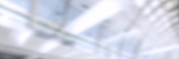 istock Light and blue hospital blurred medical background. 1212342174
