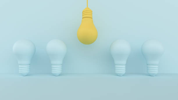 istock Yellow bulb outstanding on blue pastel background. 1212342251