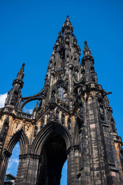 istock The Scott Monument, a Victorian Gothic monument to Scottish author Sir Walter Scott, against a clear blue sky. It is the second largest monument to a writer in the world and is located in Princes Street Gardens in Edinburgh, Scotland. 1212347343