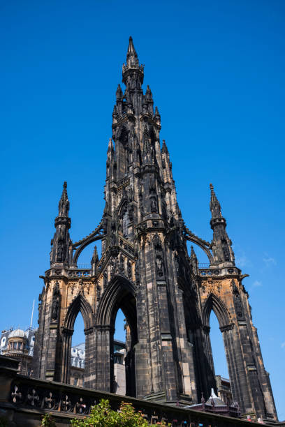 istock The Scott Monument, a Victorian Gothic monument to Scottish author Sir Walter Scott, against a clear blue sky. It is the second largest monument to a writer in the world and is located in Princes Street Gardens in Edinburgh, Scotland. 1212347424