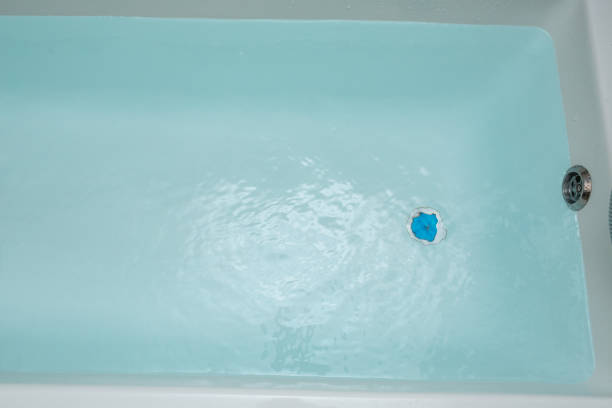 istock Blue water in the bath. Bathroom. Top view. 1212348391