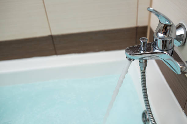 istock Blue water in the bath. Bathroom. Top view. 1212348523