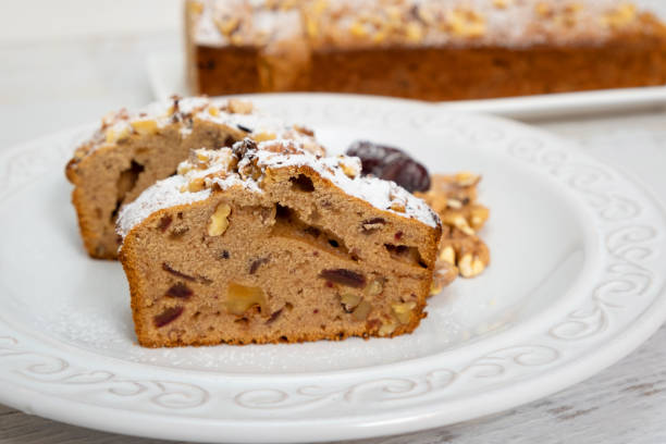 Homemade date and walnut loaf cake stock photo