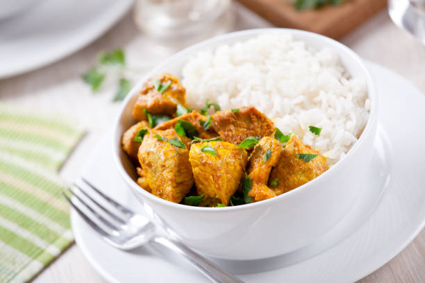 istock Bowl Of Homemade Pork Curry With Rice 1212350729