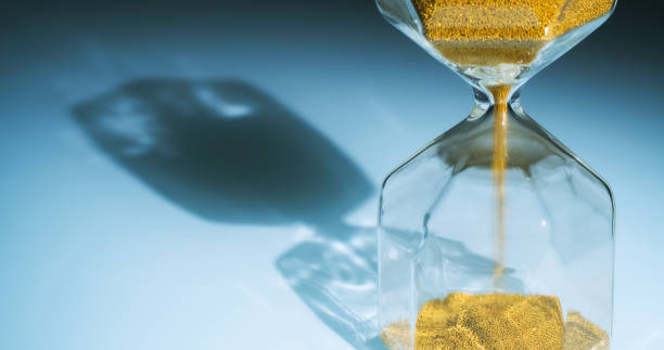istock Clode Up Shot Of Hourglass 1212350743
