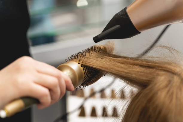istock Focused photo on female hand that holding brush 1212352984