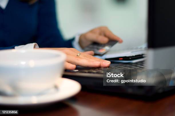 Businesswoman Checking Bank Account Stock Photo - Download Image Now - Bank Account, Business, Businesswoman