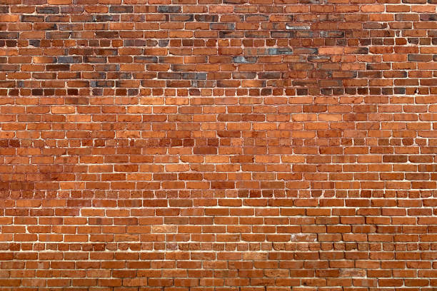 istock vintage old red brick manor garden wall 1212358843