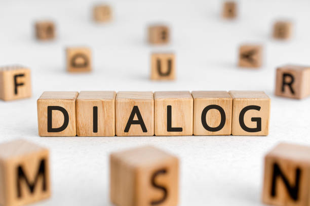 istock Dialog - word from wooden blocks with letters 1212359187
