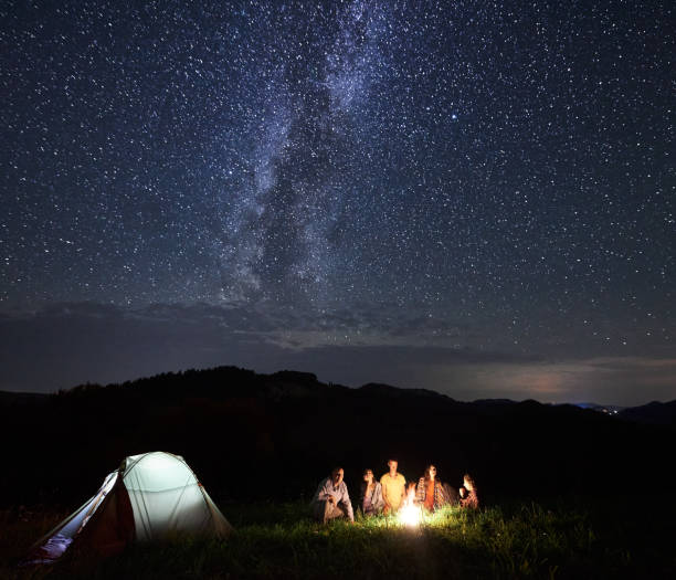 istock Tourists in the mountains by night 1212360876