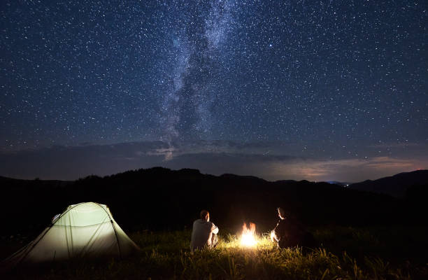 istock Tourists in the mountains by night 1212360889