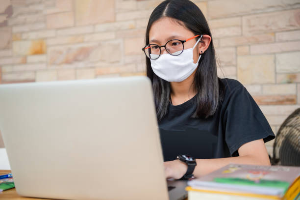 istock Junior high school girl  Do homework at home 1212360980