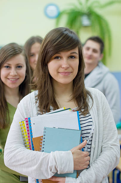 istock Teenagers in classroom 121236248