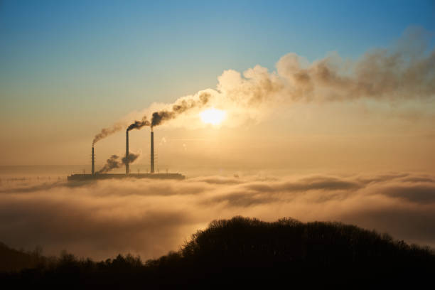 istock Smoking stacks of thermal power station 1212363028