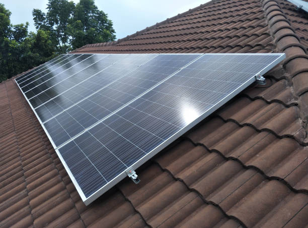 istock Solar panel   installation    on the roof with nice view 1212364288