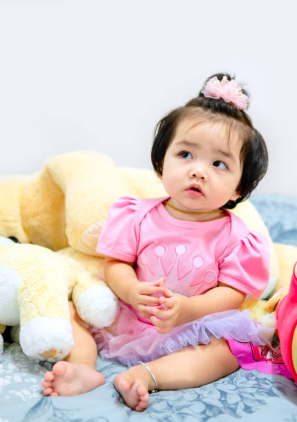 istock 1 year old cute baby girl 1212364522