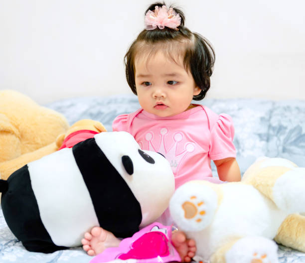 istock 1 year old cute baby girl 1212364526
