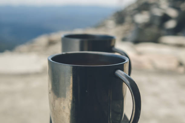 istock Drinking Coffee on mountain gaustatoppen peak. 1212365569