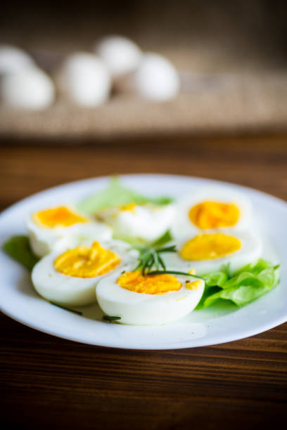 istock boiled eggs with salad leaves in a plate 1212366549