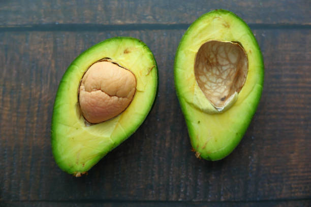 istock Close up of fresh avocado on table 1212368122