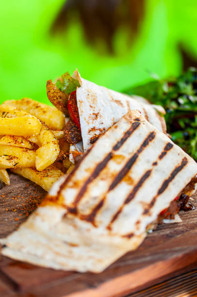istock Beef steak fajita with garniture on table 1212368870