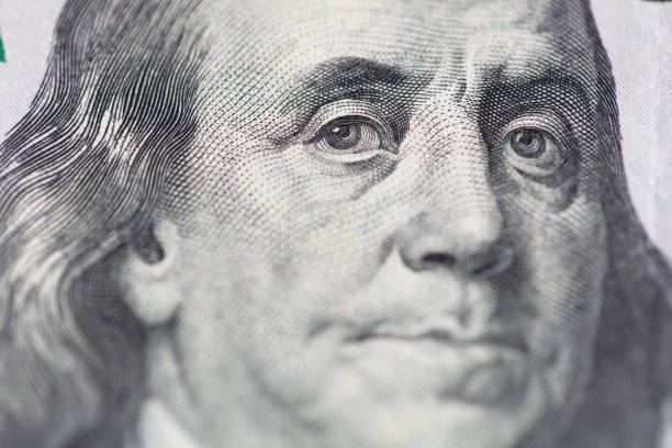 istock fragment of 100 dollar bill 1212370246