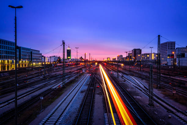 istock 2020-01-01 Donnersberger Bridge, Munich, Germany, Railroad at Sunset 1212373379