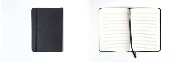 istock Notebook mock up with clean black blank for design and advertising. Notepad with chromed spring and free copy space template. On the gray background. 1212373546