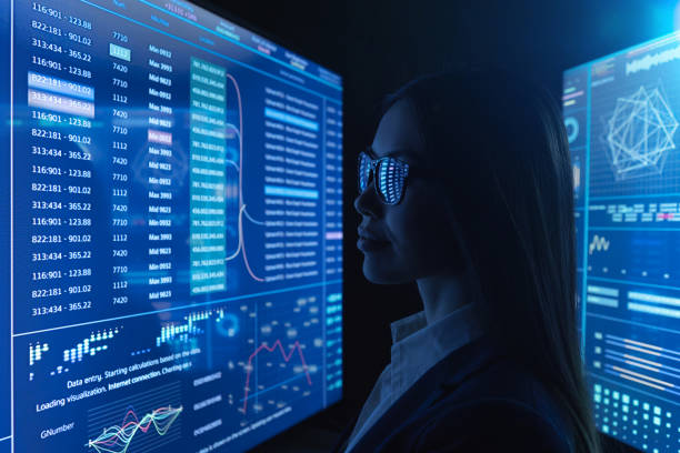 istock The businesswoman works with blue screen 1212375029