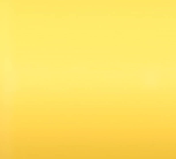 istock Empty photo studio with lighting equipment on yellow background. 1212380593