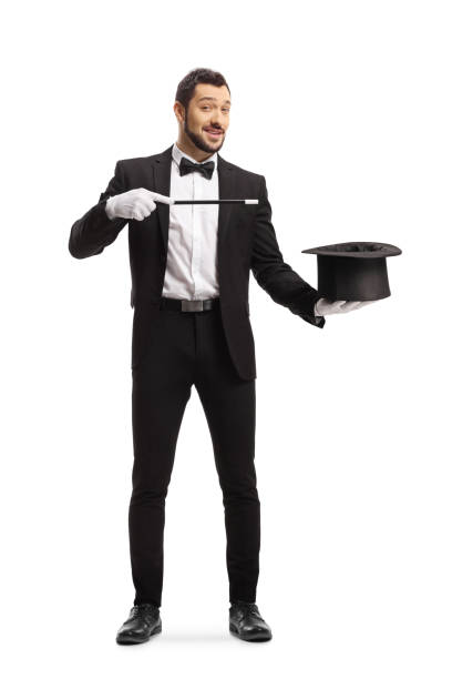 istock Magician with a magic wand and hat 1212381610