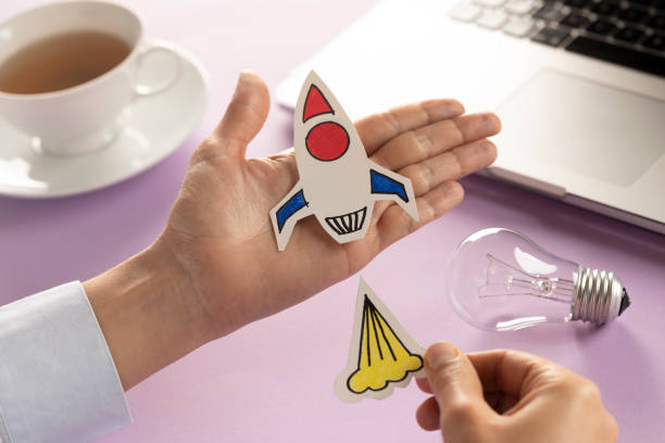 istock Business Person with Startup Rocket 1212382018