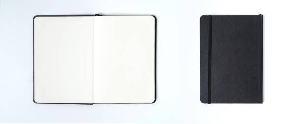 istock Notebook mock up with clean black blank for design and advertising. Notepad with chromed spring and free copy space template. On the gray background. 1212384512