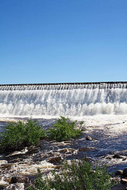 istock Owerflow of water on the man-made storage pond 121238459