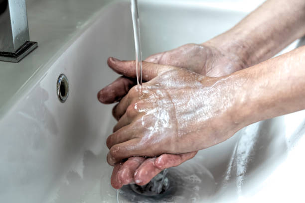 istock Washing hands with soap and water 1212390338
