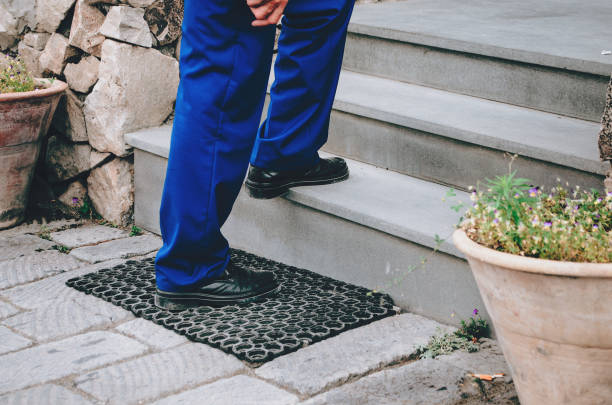 istock The man takes a step up the stairs 1212391841