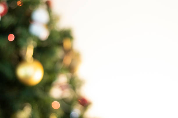 istock Defocused christmas background. Christimas tree, decoration and lights 1212394056