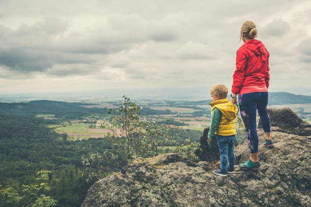 istock Mother with little boy travelling in mountains 1212394501